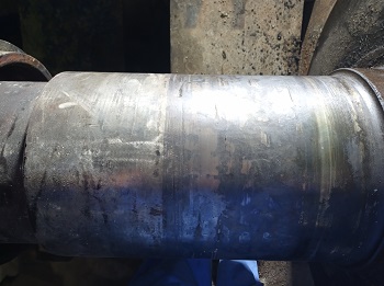 石灰石破碎机轴颈磨损现场修复